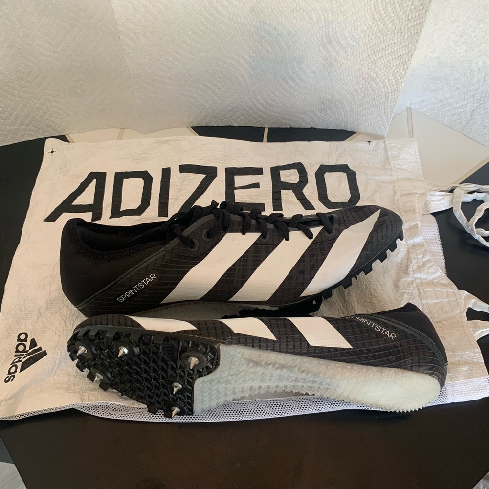 Adidas track spikes 9.5, 50% of the cleat was composed from recycled materials.